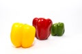 Three peppers in three color close up shot isolated Royalty Free Stock Photo