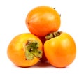 Three persimmons on white background