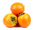 Three persimmons on white background Royalty Free Stock Photo