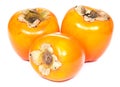 Three persimmons, white background Royalty Free Stock Photo