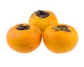 Three persimmons on white background Royalty Free Stock Photo