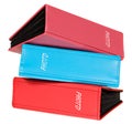 Three photograph albums pink, red and blue color.