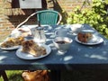 Three pieces of apple pie standing on a blue table Royalty Free Stock Photo