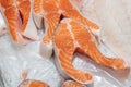 Three pieces of chilled salmon. Shallow depth of field