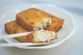 Three pieces of deep fried carrot cake with real carrot bits inside Royalty Free Stock Photo