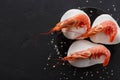 Fresh Shrimp on White Stones With Salt on a Dark Surface Ready for a Meal Royalty Free Stock Photo