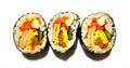 three pieces of kimbab arranged in a row on a white background Royalty Free Stock Photo