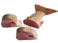 Three pieces of red-finned mullet isolated on a white background