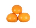 Three piled up vivid color ripe oranges isolated on white background Royalty Free Stock Photo