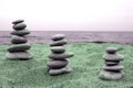 Three piles of balanced stones Royalty Free Stock Photo