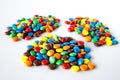 Three piles of colored smarties Royalty Free Stock Photo