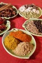 Three piles of indian powder spice on plate Royalty Free Stock Photo
