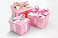 three pink gift box with pink, gold, and white ribbons Royalty Free Stock Photo