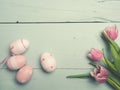 Three pink tulips with Easter decoration Royalty Free Stock Photo