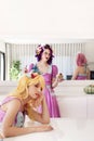 Pinup girls with colorful outfits on a table
