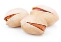 Three pistachio nuts on white Royalty Free Stock Photo