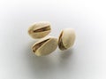 Three pistachios isolated