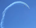 Three planes looping the loop