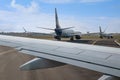 Three planes taxiing at runway, ready to takeoff at Schiphol Royalty Free Stock Photo