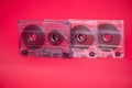 Three plastic audio tape cassettes