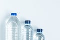 Three plastic bottles filled with mineral water from above Royalty Free Stock Photo