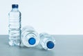 Three plastic bottles filled with mineral water on white background Royalty Free Stock Photo