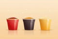 Three Plastic Cups with Different Colors of Sand Royalty Free Stock Photo
