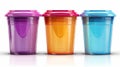 Three plastic cups with lids in different colors Royalty Free Stock Photo