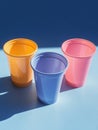 Three Plastic Cups on Table Royalty Free Stock Photo