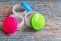Small storage tubs, with brightly coloured lids. Royalty Free Stock Photo
