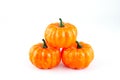 Plastic toy pumpkin for halloween decoration isolated on white background Royalty Free Stock Photo