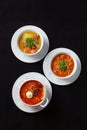 Three plates of soup