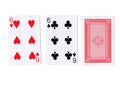 Three playing cards with a pair of sixes revealed.
