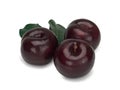 Three plums with leaves on white background Royalty Free Stock Photo
