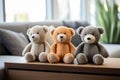 Three Plush toys bears in grey and yellow colors sit together, projecting warmth and friendliness. eco-conscious Royalty Free Stock Photo