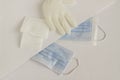 Three ply structure,single use hygenic face mask,sterile gauze pads and gloves on the white