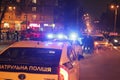 Three Police vehicle lights flashing on neighborhood. Royalty Free Stock Photo