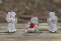 Three porcelain cupids figurine Royalty Free Stock Photo