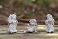 Three porcelain cupids figurines Royalty Free Stock Photo