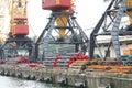 Three port cranes with the cargo Royalty Free Stock Photo