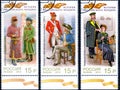 Three postage stamps printed in Russia with the image of post office workers of different centuries and the inscription in Russian Royalty Free Stock Photo