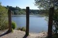 Three Posts Beside A Lake