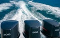 Three powerful engines for 200 hp on a speedboat.