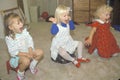 Three preschool girls singing at their daycare center, Washington D.C.