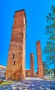 Three medieval towers on Piazza Leonardo da Vinci in Pavia, Italy Royalty Free Stock Photo