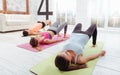 Three pretty girls enjoying group training Royalty Free Stock Photo