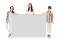 Three pretty women showing an empty board Royalty Free Stock Photo