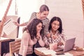 Three promising businesswomen working on work schedule for their employees