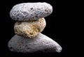 Three pumice stones on black Royalty Free Stock Photo