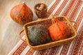 Three pumpkin varieties in a basket
